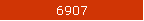 6907